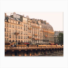 Paris Buildings By The Seine Bathed In Golden Light Canvas Print