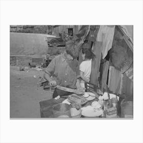 Boy Living In Camp Near Mays Avenue Making Sandwich, This Food Is Distributed By Saint Anthony S Hospital Canvas Print