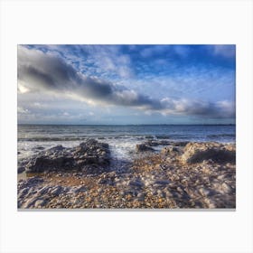 Pebbles , sea and clouds at Ogmore Canvas Print