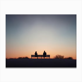 Couple Sitting On Bench At Sunset Canvas Print