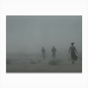 People Walking In The Dusty Desert Canvas Print