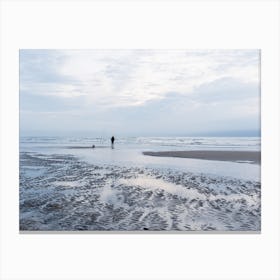 Lone Fisherman On The Beach During The Blue Hour Canvas Print