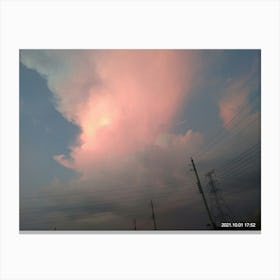 Fluffy clouds over the earth crust Canvas Print