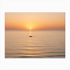 A Solitary Boat Sailing On A Calm Sea At Sunset Canvas Print