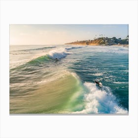 Two Surfers Catching Two Waves Canvas Print