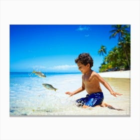 Little Boy Playing With Fish On The Beach Canvas Print