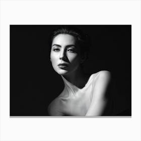 An Intriguing Monochrome Portrait Of A Mysterious Figure Illuminated In Soft Light Offering An Eni Canvas Print