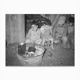 Mexican Children Sitting Outside Of Corral Before Fire Built In Wash Tub, Robstown, Texas By Russell Lee Canvas Print