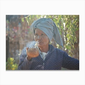 Woman Smokes A Pipe Canvas Print