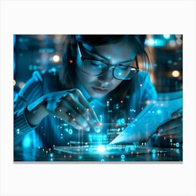 A Woman Wearing Glasses Is Working On A Tablet With Glowing Blue And Red Digital Information Superimposed On The Image Canvas Print