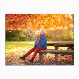 Senior Woman Sitting Under A Tree Canvas Print