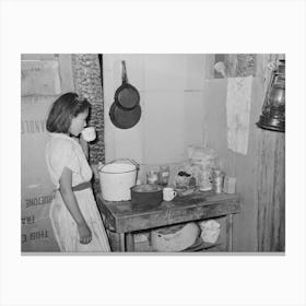 Mexican Girl Drinking A Cup Of Water In The Kitchen Of Her Home In San Antonio, Texas By Russell Lee Canvas Print