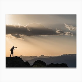 Silhouette Of A Mountain Climber Canvas Print