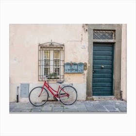 Bike And Door In Italy Canvas Print