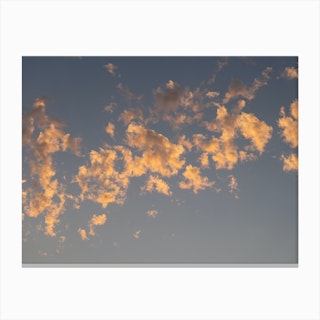 Scenic sunset clouds in pale blue sky 2 Canvas Print