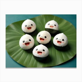 Cute Rice Balls With Smiling Faces On A Green Leaf Canvas Print