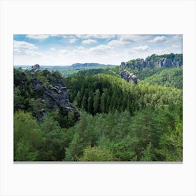 Sandstone rocks and green forest near the Bastei in Saxon Switzerland Canvas Print