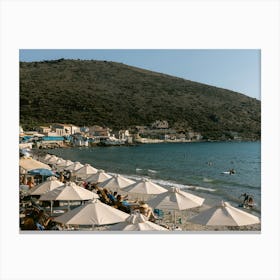 Beach and umbrellas Canvas Print