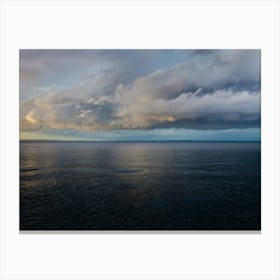 Clouds over the water Canvas Print