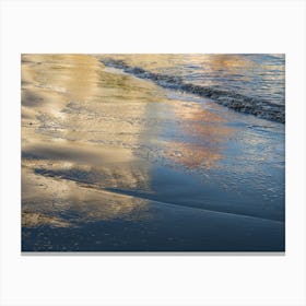Golden and blue reflections in the sand Canvas Print