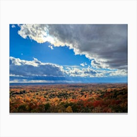 Cumulus Clouds Towering High Above A Serene Autumnal Landscape Sunlight Piercing Through Overcast S (4) Canvas Print