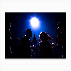 Silhouette Of People At A Club Canvas Print