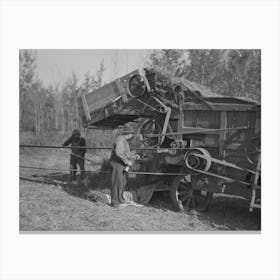 Oiling And Greasing Threshing Machine Near Littlefork, Minnesota By Russell Lee Canvas Print