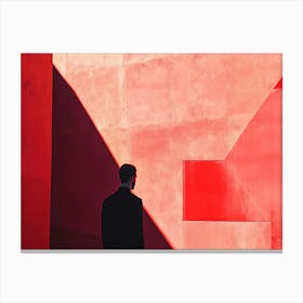 Man In Front Of Red Building Canvas Print