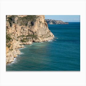 Cliffs of the Mediterranean coast and turquoise sea water Canvas Print
