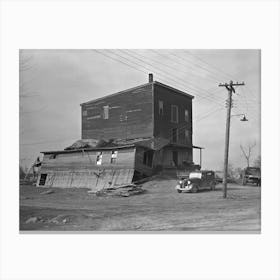 Old Flour Mill Damaged By The Flood, Note Wrought Iron Streetlight Fixture, Shawneetown, Illinois By Russell Lee Canvas Print