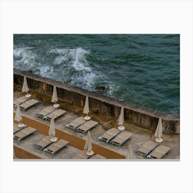 Seaside Sun Loungers And Parasols  Canvas Print