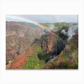 Rainbow Over A Canyon Canvas Print