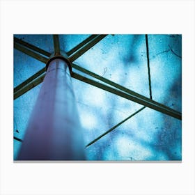 Abstract Image Of A Blue Parasol With Metal Frames Canvas Print