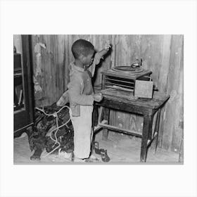 Child Playing Phonograph In Cabin Home, Transylvania Project, Louisiana By Russell Lee Canvas Print