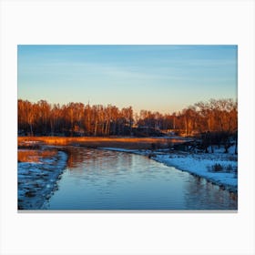 Sunrise Over A River Canvas Print