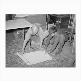 Mrs Hutton And Her Grandson Unrolling Wallpaper For The Kitchen, Pie Town, New Mexico By Russell Lee Canvas Print