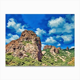 Majestic Rocky Peak Under a Clear Blue Sky. The image depicts a stunning natural landscape featuring a prominent rocky peak rising above a lush, green hillside. The sky is a vibrant blue with a few scattered clouds, adding to the serene and picturesque quality of the scene. The rocky formations and dense vegetation create a striking contrast, making the image visually captivating. 1 Canvas Print