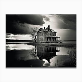 Old House Mirrored On A Still Lakes Surface Foreboding Moody Clouds Above Reflection Tranquility Canvas Print