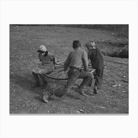 Farm Children Playing On Homemade Merry Go Round, Williams County, North Dakota By Russell Lee Canvas Print