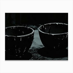 Two Black Cups On A Table Canvas Print