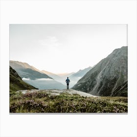 Person Standing On Top Of A Mountain Canvas Print