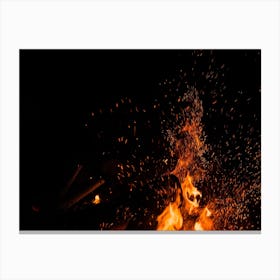 Sparks Bounce Off From A Bonfire At Night After A Log Thrown Into It 2 Canvas Print