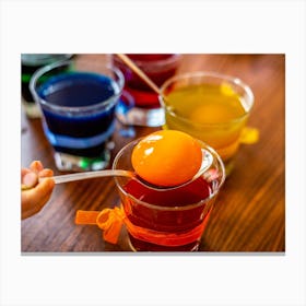 Child Pouring Orange Juice Into Glasses Canvas Print