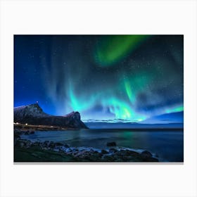 Green Aurora Lights Over Rocky Shore During Night Time Canvas Print