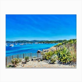 Serene Seascape Escape. The image depicts a tranquil coastal scene featuring a small, lush island surrounded by clear blue waters. Several boats are anchored nearby, and a person is seen riding a jet ski, leaving a trail of white foam behind. The sky is clear, enhancing the vibrant blue hues of the sea and sky, creating a picturesque and serene atmosphere. 3 Canvas Print