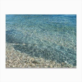 Clear water and rocks in a Mediterranean bay Canvas Print