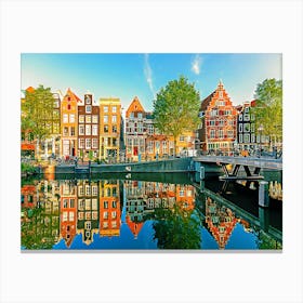 Old Historic Dutch Houses Reflecting In The Canal On A Sunny Day, Amsterdam, Netherlands Canvas Print