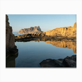 Rocks and their reflection in the Mediterranean Canvas Print