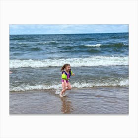 Little Girl Running In The Ocean Canvas Print