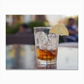 Glass With Cola And Ice And Lemon On A Table Outside 1 Canvas Print